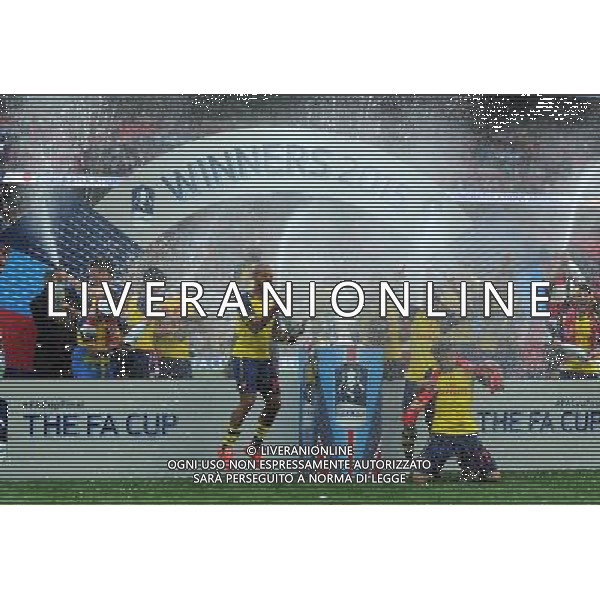 Arsenal players celebrate winning the FA Cup Photographer Ashley Crowden/CameraSport Football - The FA Cup Final - Aston Villa v Arsenal - Saturday 30th May 2015 - Wembley - London Â© CameraSport - 43 Linden Ave. Countesthorpe. Leicester. England. LE8 5PG - Tel: +44 (0) 116 277 4147 - admin@camerasport.com - www.camerasport.com AG ALDO LIVERANI SAS ONLY ITALY