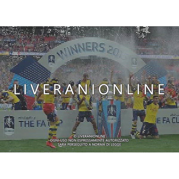 Arsenal players celebrate winning the FA Cup Photographer Ashley Crowden/CameraSport Football - The FA Cup Final - Aston Villa v Arsenal - Saturday 30th May 2015 - Wembley - London Â© CameraSport - 43 Linden Ave. Countesthorpe. Leicester. England. LE8 5PG - Tel: +44 (0) 116 277 4147 - admin@camerasport.com - www.camerasport.com AG ALDO LIVERANI SAS ONLY ITALY