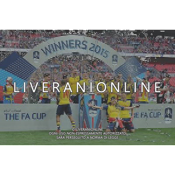 Arsenal players celebrate winning the FA Cup Photographer Ashley Crowden/CameraSport Football - The FA Cup Final - Aston Villa v Arsenal - Saturday 30th May 2015 - Wembley - London Â© CameraSport - 43 Linden Ave. Countesthorpe. Leicester. England. LE8 5PG - Tel: +44 (0) 116 277 4147 - admin@camerasport.com - www.camerasport.com AG ALDO LIVERANI SAS ONLY ITALY