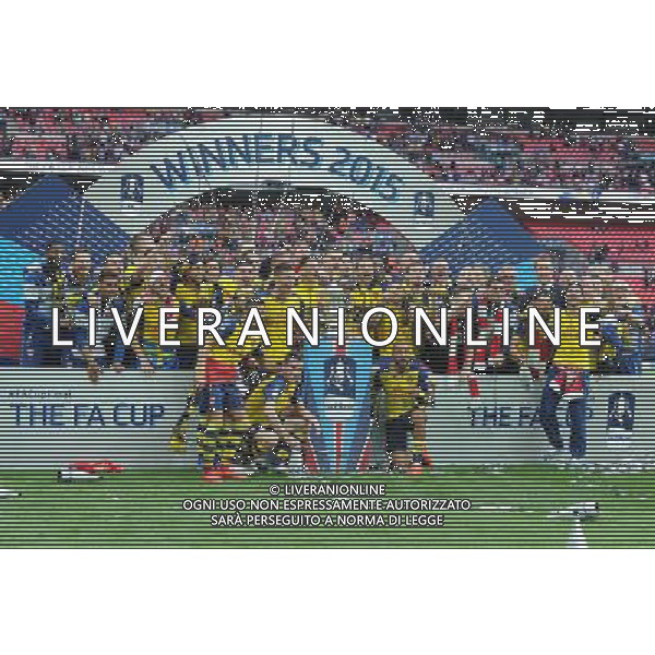 Arsenal players celebrate winning the FA Cup Photographer Ashley Crowden/CameraSport Football - The FA Cup Final - Aston Villa v Arsenal - Saturday 30th May 2015 - Wembley - London Â© CameraSport - 43 Linden Ave. Countesthorpe. Leicester. England. LE8 5PG - Tel: +44 (0) 116 277 4147 - admin@camerasport.com - www.camerasport.com AG ALDO LIVERANI SAS ONLY ITALY