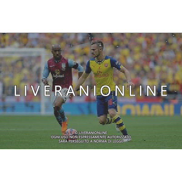 Arsenal\'s Aaron Ramsey in action during todays match Photographer Ian Cook/CameraSport Football - The FA Cup Final - Aston Villa v Arsenal - Saturday 30th May 2015 - Wembley - London © CameraSport - 43 Linden Ave. Countesthorpe. Leicester. England. LE8 5PG - Tel: +44 (0) 116 277 4147 - admin@camerasport.com - www.camerasport.com AG ALDO LIVERANI SAS ONLY ITALY
