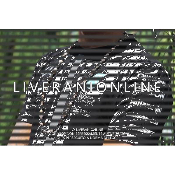 The necklace worn by Lewis Hamilton (GBR) Mercedes AMG F1. 04.06.2015. Formula 1 World Championship, Rd 7, Canadian Grand Prix, Montreal, Canada, Preparation Day. /AGENZIA ALDO LIVERANI Sas - ITALY ONLY - EDITORIAL USE ONLY
