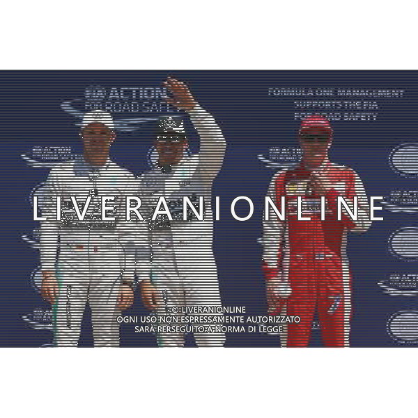 Qualifying top three in parc ferme (L to R): Nico Rosberg (GER) Mercedes AMG F1, second; Lewis Hamilton (GBR) Mercedes AMG F1, pole position; Kimi Raikkonen (FIN) Ferrari, third. 06.06.2015. Formula 1 World Championship, Rd 7, Canadian Grand Prix, Montreal, Canada, Qualifying Day. /AGENZIA ALDO LIVERANI Sas - ITALY ONLY - EDITORIAL USE ONLY - Prove ufficiali