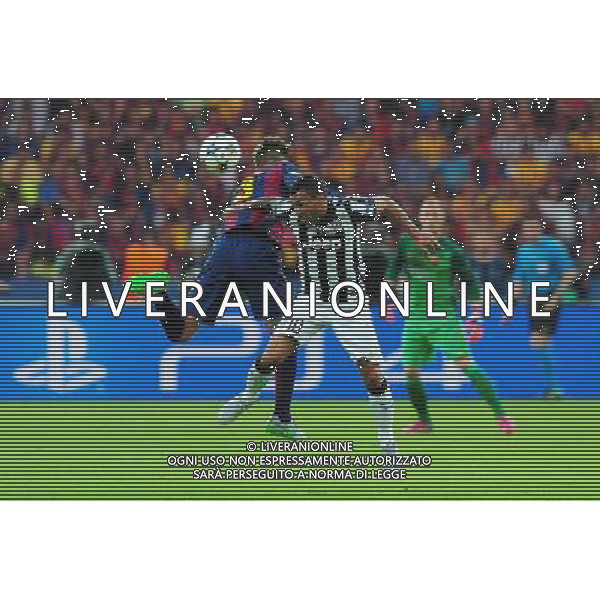Juventus\' Carlos Tevez vies for possession with Barcelona\'s Gerard Pique Photographer Chris Vaughan/CameraSport Football - UEFA Champions League Final - Juventus v Barcelona - Saturday 6th June 2015 - Olympiastadion - Berlin, Germany © CameraSport - 43 Linden Ave. Countesthorpe. Leicester. England. LE8 5PG - Tel: +44 (0) 116 277 4147 - admin@camerasport.com - www.camerasport.com /AGENZIA ALDO LIVERANI Sas - ITALY ONLY - EDITORIAL USE ONLY - Juventus - Barcellona UEFA Champions League 2014/2015 Finale Berlino - 06.06.2015