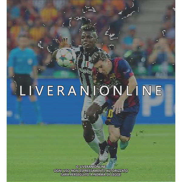 Barcelona\'s Lionel Messi vies for possession with Juventus\' Paul Pogba Photographer Chris Vaughan/CameraSport Football - UEFA Champions League Final - Juventus v Barcelona - Saturday 6th June 2015 - Olympiastadion - Berlin, Germany © CameraSport - 43 Linden Ave. Countesthorpe. Leicester. England. LE8 5PG - Tel: +44 (0) 116 277 4147 - admin@camerasport.com - www.camerasport.com /AGENZIA ALDO LIVERANI Sas - ITALY ONLY - EDITORIAL USE ONLY - Juventus - Barcellona UEFA Champions League 2014/2015 Finale Berlino - 06.06.2015