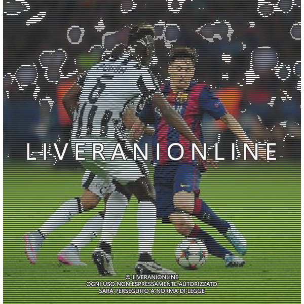 Barcelona\'s Lionel Messi is tackled by Juventus\' Paul Pogba Photographer Chris Vaughan/CameraSport Football - UEFA Champions League Final - Juventus v Barcelona - Saturday 6th June 2015 - Olympiastadion - Berlin, Germany © CameraSport - 43 Linden Ave. Countesthorpe. Leicester. England. LE8 5PG - Tel: +44 (0) 116 277 4147 - admin@camerasport.com - www.camerasport.com /AGENZIA ALDO LIVERANI Sas - ITALY ONLY - EDITORIAL USE ONLY - Juventus - Barcellona UEFA Champions League 2014/2015 Finale Berlino - 06.06.2015