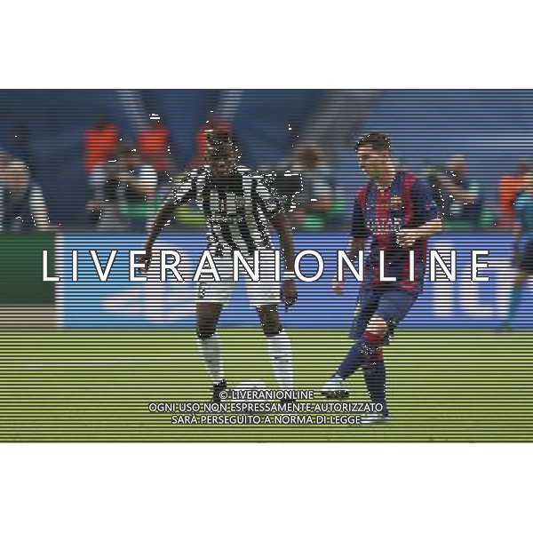 BERLIN 06.06.2015 FINALOWY MECZ LIGA MISTRZOW SEZON 2014/15: JUVENTUS TURYN - FC BARCELONA --- UEFA CHAMPIONS LEAGUE FINAL MATCH: JUVENTUS TURIN - FC BARCELONA PAUL POGBA LOINEL MESSI FOT. PIOTR KUCZA/NEWSPIX.PL --- Newspix.pl /AGENZIA ALDO LIVERANI Sas - ITALY ONLY - EDITORIAL USE ONLY - Juventus - Barcellona UEFA Champions League 2014/2015 Finale Berlino - 06.06.2015 *** Local Caption *** www.newspix.pl mail us: info@newspix.pl call us: 0048 022 23 22 222 --- Polish Picture Agency by Ringier Axel Springer Poland