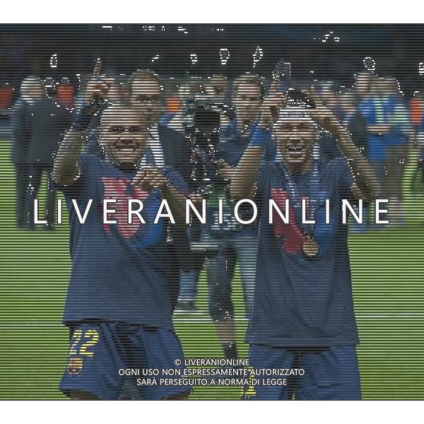 Barcelona\'s Daniel Alves, left, and Barcelona\'s Neymar celebrate winning the Champions League Photographer Chris Vaughan/CameraSport Football - UEFA Champions League Final - Juventus v Barcelona - Saturday 6th June 2015 - Olympiastadion - Berlin, Germany Â© CameraSport - 43 Linden Ave. Countesthorpe. Leicester. England. LE8 5PG - Tel: +44 (0) 116 277 4147 - admin@camerasport.com - www.camerasport.com AG ALDO LIVERANI SAS ONLY ITALY