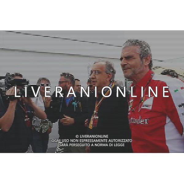 (L to R): Sergio Marchionne (ITA) Ferrari President and CEO of Fiat Chrysler Automobiles with Maurizio Arrivabene (ITA) Ferrari Team Principal. 07.06.2015. Formula 1 World Championship, Rd 7, Canadian Grand Prix, Montreal, Canada, Race Day. /AGENZIA ALDO LIVERANI Sas - ITALY ONLY - EDITORIAL USE ONLY