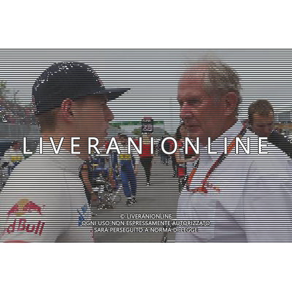 (L to R): Daniil Kvyat (RUS) Red Bull Racing with Dr Helmut Marko (AUT) Red Bull Motorsport Consultant on the grid. 07.06.2015. Formula 1 World Championship, Rd 7, Canadian Grand Prix, Montreal, Canada, Race Day. AG ALDO LIVERANI SAS ONLY ITALY