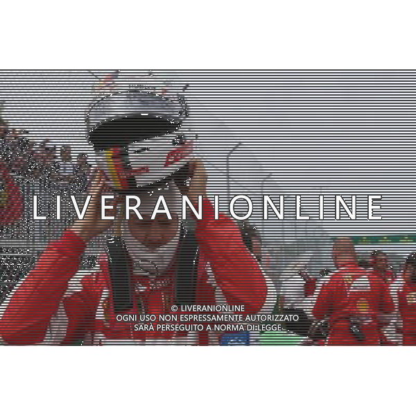 Sebastian Vettel (GER) Ferrari on the grid. 07.06.2015. Formula 1 World Championship, Rd 7, Canadian Grand Prix, Montreal, Canada, Race Day. AG ALDO LIVERANI SAS ONLY ITALY