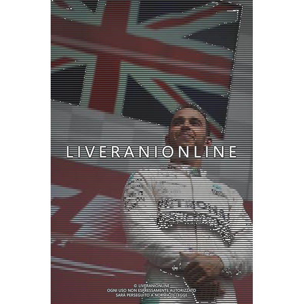 Race winner Lewis Hamilton (GBR) Mercedes AMG F1 celebrates on the podium. 07.06.2015. Formula 1 World Championship, Rd 7, Canadian Grand Prix, Montreal, Canada, Race Day. AG ALDO LIVERANI SAS ONLY ITALY