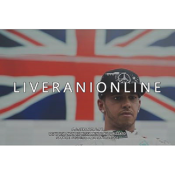 Race winner Lewis Hamilton (GBR) Mercedes AMG F1 on the podium. 07.06.2015. Formula 1 World Championship, Rd 7, Canadian Grand Prix, Montreal, Canada, Race Day. AG ALDO LIVERANI SAS ONLY ITALY