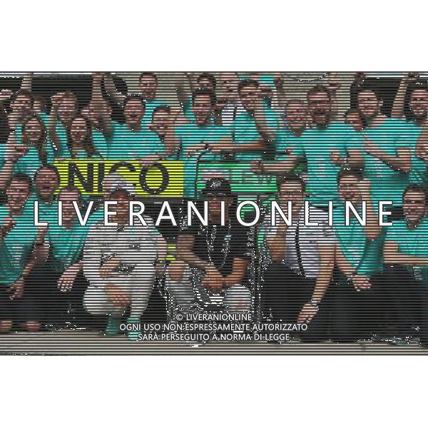 Race winner Lewis Hamilton (GBR) Mercedes AMG F1 celebrates with second placed team mate Nico Rosberg (GER) Mercedes AMG F1 (Left); Peter Bonnington (GBR) Mercedes AMG F1 Race Engineer (Right), and the team. 07.06.2015. Formula 1 World Championship, Rd 7, Canadian Grand Prix, Montreal, Canada, Race Day. AG ALDO LIVERANI SAS ONLY ITALY