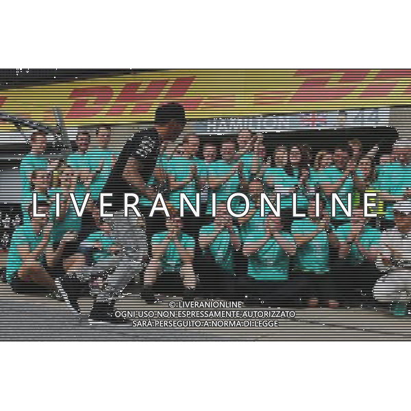Race winner Lewis Hamilton (GBR) Mercedes AMG F1 celebrates with the team. 07.06.2015. Formula 1 World Championship, Rd 7, Canadian Grand Prix, Montreal, Canada, Race Day. AG ALDO LIVERANI SAS ONLY ITALY