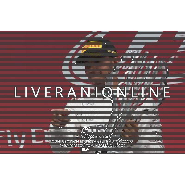 Race winner Lewis Hamilton (GBR) Mercedes AMG F1 celebrates on the podium. 07.06.2015. Formula 1 World Championship, Rd 7, Canadian Grand Prix, Montreal, Canada, Race Day. AG ALDO LIVERANI SAS ONLY ITALY