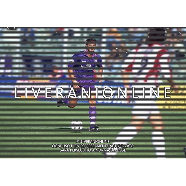 RETROSPETTIVA AMORUSO LORENZO CALCIATORE NELLA FOTO AMORUSO LORENZO CON LA MAGLIA DELLA FIORENTINA AG ALDO LIVERANI SAS