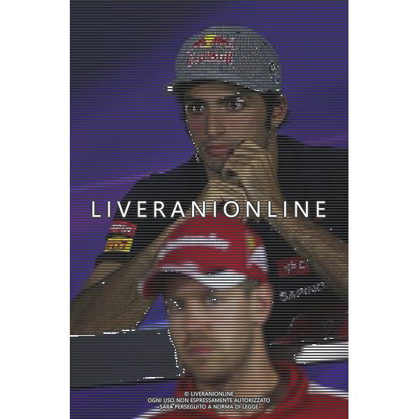 Carlos Sainz Jr (ESP) Scuderia Toro Rosso and Sebastian Vettel (GER) Ferrari in the FIA Press Conference. 18.06.2015. Formula 1 World Championship, Rd 8, Austrian Grand Prix, Spielberg, Austria, Preparation Day. /AGENZIA ALDO LIVERANI Sas - ITALY ONLY - EDITORIAL USE ONLY