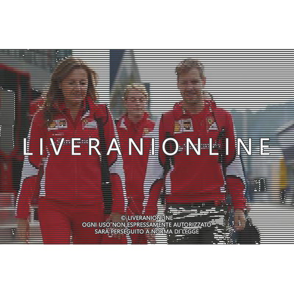 (L to R): Stefania Bocchi (ITA) Ferrari Press Officer with Sebastian Vettel (GER) Ferrari. 19.06.2015. Formula 1 World Championship, Rd 8, Austrian Grand Prix, Spielberg, Austria, Practice Day. /AGENZIA ALDO LIVERANI Sas - ITALY ONLY - EDITORIAL USE ONLY - Prove Libere