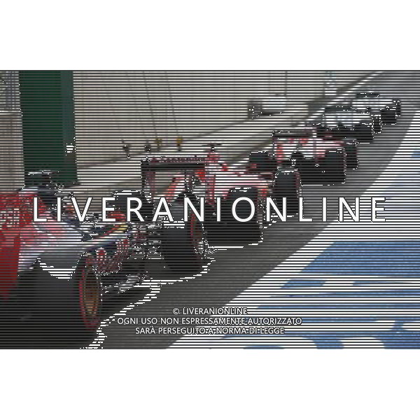 Nico Rosberg (GER) Mercedes AMG F1 W06; Lewis Hamilton (GBR) Mercedes AMG F1 W06; Sebastian Vettel (GER) Ferrari SF15-T; Kimi Raikkonen (FIN) Ferrari SF15-T; and Max Verstappen (NLD) Scuderia Toro Rosso STR10 at the end of the pit lane. 20.06.2015. Formula 1 World Championship, Rd 8, Austrian Grand Prix, Spielberg, Austria, Qualifying Day. /AGENZIA ALDO LIVERANI Sas - ITALY ONLY - EDITORIAL USE ONLY - Prove Ufficiali