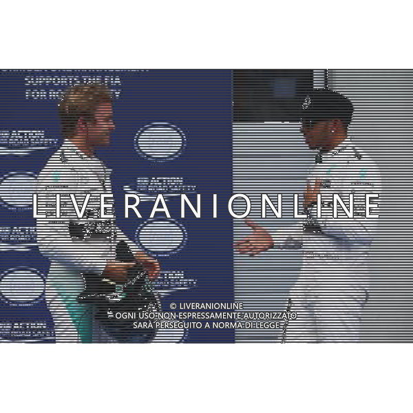 (L to R): second placed Nico Rosberg (GER) Mercedes AMG F1 with team mate Lewis Hamilton (GBR) Mercedes AMG F1, who took pole position. 20.06.2015. Formula 1 World Championship, Rd 8, Austrian Grand Prix, Spielberg, Austria, Qualifying Day. /AGENZIA ALDO LIVERANI Sas - ITALY ONLY - EDITORIAL USE ONLY - Prove Ufficiali