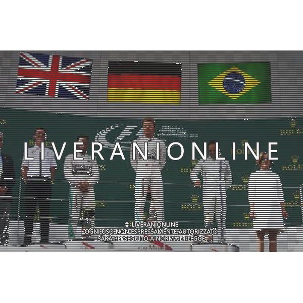 The podium (L to R): Lewis Hamilton (GBR) Mercedes AMG F1, second; Nico Rosberg (GER) Mercedes AMG F1, race winner; Felipe Massa (BRA) Williams, third.. 21.06.2015. Formula 1 World Championship, Rd 8, Austrian Grand Prix, Spielberg, Austria, Race Day. /AGENZIA ALDO LIVERANI Sas - ITALY ONLY - EDITORIAL USE ONLY - GARA