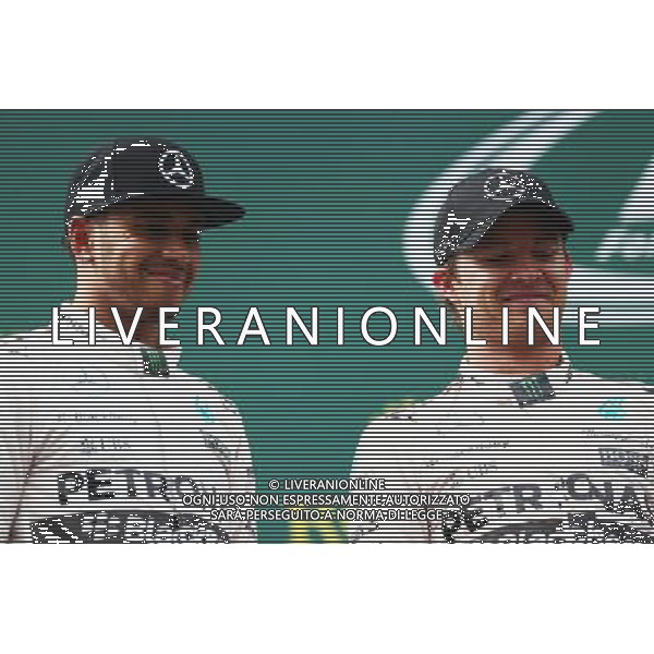 The podium (L to R): second placed Lewis Hamilton (GBR) Mercedes AMG F1 with race winner Nico Rosberg (GER) Mercedes AMG F1. 21.06.2015. Formula 1 World Championship, Rd 8, Austrian Grand Prix, Spielberg, Austria, Race Day. /AGENZIA ALDO LIVERANI Sas - ITALY ONLY - EDITORIAL USE ONLY - GARA