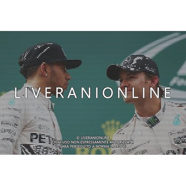 The podium (L to R): second placed Lewis Hamilton (GBR) Mercedes AMG F1 with race winner Nico Rosberg (GER) Mercedes AMG F1. 21.06.2015. Formula 1 World Championship, Rd 8, Austrian Grand Prix, Spielberg, Austria, Race Day. /AGENZIA ALDO LIVERANI Sas - ITALY ONLY - EDITORIAL USE ONLY - GARA