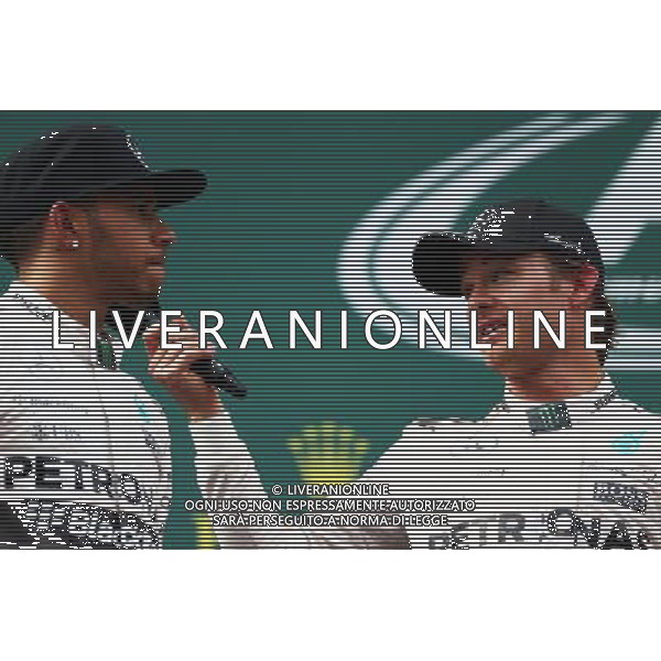 The podium (L to R): second placed Lewis Hamilton (GBR) Mercedes AMG F1 with race winner Nico Rosberg (GER) Mercedes AMG F1. 21.06.2015. Formula 1 World Championship, Rd 8, Austrian Grand Prix, Spielberg, Austria, Race Day. /AGENZIA ALDO LIVERANI Sas - ITALY ONLY - EDITORIAL USE ONLY - GARA