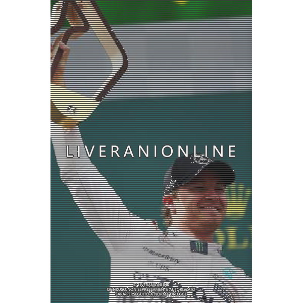 Race winner Nico Rosberg (GER) Mercedes AMG F1 celebrates on the podium. 21.06.2015. Formula 1 World Championship, Rd 8, Austrian Grand Prix, Spielberg, Austria, Race Day. /AGENZIA ALDO LIVERANI Sas - ITALY ONLY - EDITORIAL USE ONLY - GARA