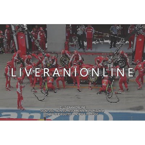 Sebastian Vettel (GER) Ferrari SF15-T has a long pit stop with a stuck rear right wheel. 21.06.2015. Formula 1 World Championship, Rd 8, Austrian Grand Prix, Spielberg, Austria, Race Day. AG ALDO LIVERANI SAS ONLY ITALY