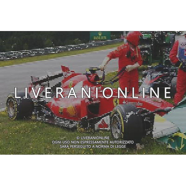 The damaged Ferrari SF15-T of race retiree Kimi Raikkonen (FIN) Ferrari. 21.06.2015. Formula 1 World Championship, Rd 8, Austrian Grand Prix, Spielberg, Austria, Race Day. AG ALDO LIVERANI SAS ONLY ITALY