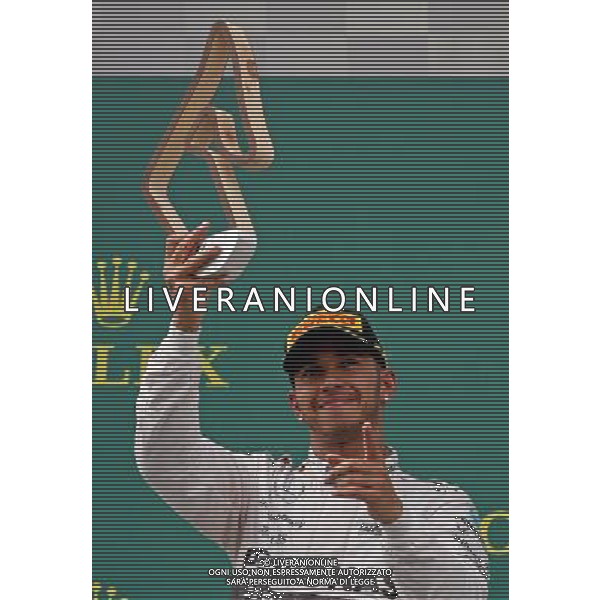Lewis Hamilton (GBR) Mercedes AMG F1 celebrates his second position on the podium. 21.06.2015. Formula 1 World Championship, Rd 8, Austrian Grand Prix, Spielberg, Austria, Race Day. AG ALDO LIVERANI SAS ONLY ITALY