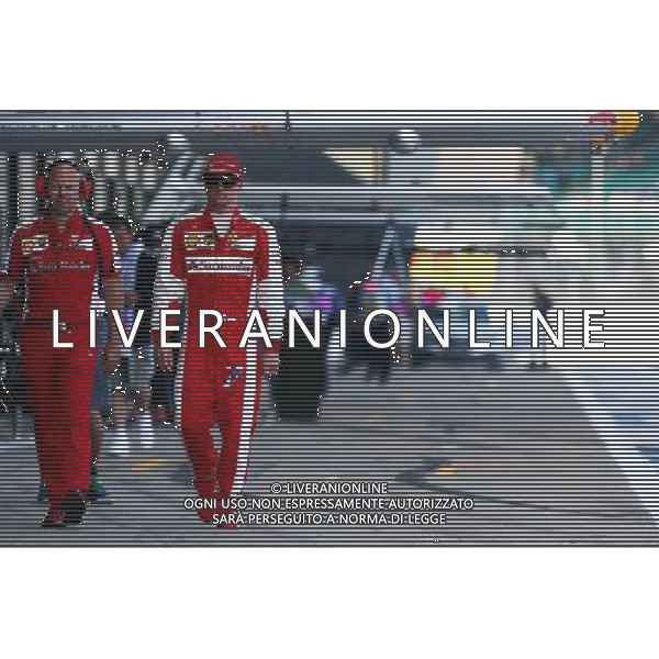 Kimi Raikkonen (FIN) Ferrari with Mark Arnall (GBR) Personal Trainer. 04.07.2015. Formula 1 World Championship, Rd 9, British Grand Prix, Silverstone, England, Qualifying Day. AG ALDO LIVERANI SAS ONLY ITALY