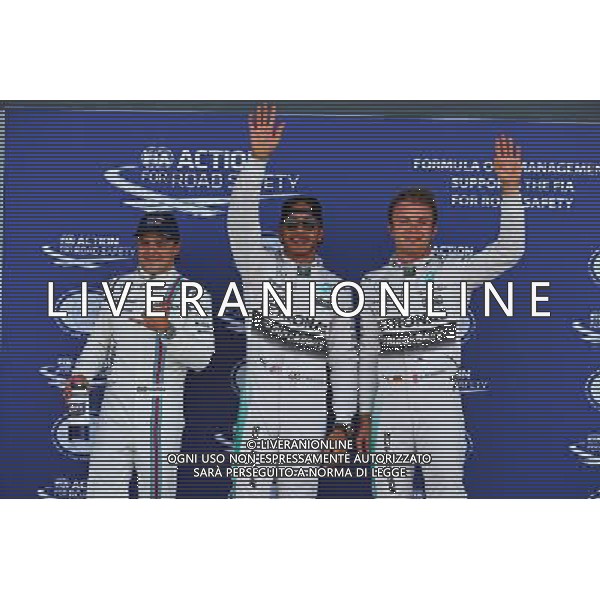 Qualifying top three in parc ferme (L to R): Felipe Massa (BRA) Williams, third; Lewis Hamilton (GBR) Mercedes AMG F1, pole position; Nico Rosberg (GER) Mercedes AMG F1, second. 04.07.2015. Formula 1 World Championship, Rd 9, British Grand Prix, Silverstone, England, Qualifying Day. AG ALDO LIVERANI SAS ONLY ITALY
