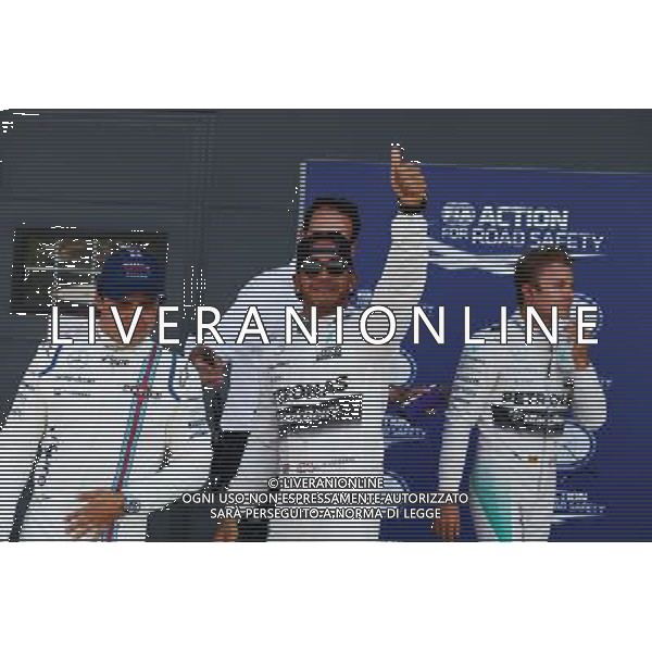 Qualifying top three in parc ferme (L to R): Felipe Massa (BRA) Williams, third; Lewis Hamilton (GBR) Mercedes AMG F1, pole position; Nico Rosberg (GER) Mercedes AMG F1, second. 04.07.2015. Formula 1 World Championship, Rd 9, British Grand Prix, Silverstone, England, Qualifying Day. AG ALDO LIVERANI SAS ONLY ITALY