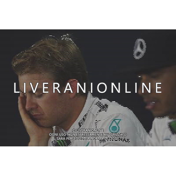 (L to R): Nico Rosberg (GER) Mercedes AMG F1 with team mate Lewis Hamilton (GBR) Mercedes AMG F1 in the FIA Press Conference. 04.07.2015. Formula 1 World Championship, Rd 9, British Grand Prix, Silverstone, England, Qualifying Day. AG ALDO LIVERANI SAS ONLY ITALY