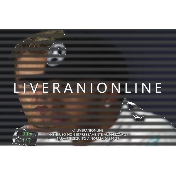 (L to R): Nico Rosberg (GER) Mercedes AMG F1 with team mate Lewis Hamilton (GBR) Mercedes AMG F1 in the FIA Press Conference. 04.07.2015. Formula 1 World Championship, Rd 9, British Grand Prix, Silverstone, England, Qualifying Day. AG ALDO LIVERANI SAS ONLY ITALY