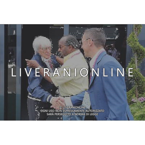 (L to R): Bernie Ecclestone (GBR) with Everett Souratt (USA) and Frankie Dettori (ITA) Jockey. 05.07.2015. Formula 1 World Championship, Rd 9, British Grand Prix, Silverstone, England, Race Day. AG ALDO LIVERANI SAS ONLY ITALY