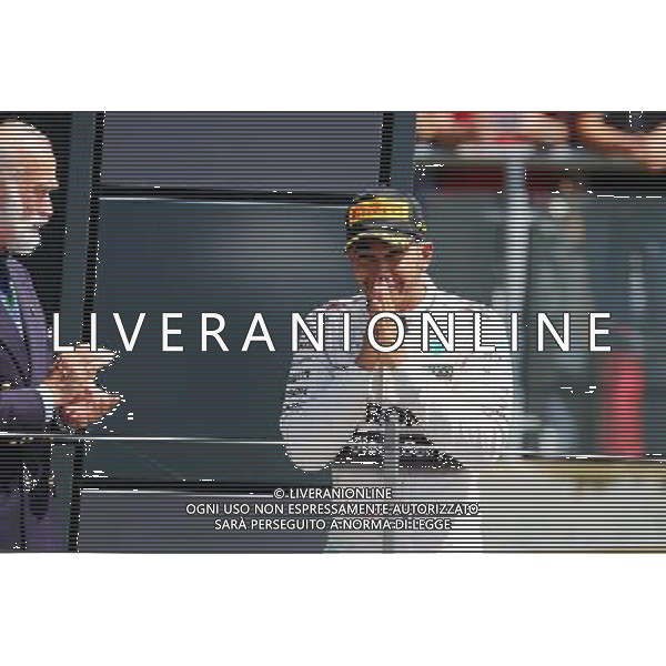 Race winner Lewis Hamilton (GBR) Mercedes AMG F1 celebrates on the podium. 05.07.2015. Formula 1 World Championship, Rd 9, British Grand Prix, Silverstone, England, Race Day. AG ALDO LIVERANI SAS ONLY ITALY