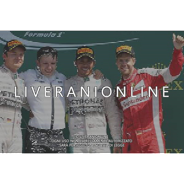 Nico Rosberg (GER), Mercedes AMG F1 Team, Lewis Hamilton (GBR), Mercedes AMG F1 Team and Sebastian Vettel (GER), Scuderia Ferrari 05.07.2015. Formula 1 World Championship, Rd 9, British Grand Prix, Silverstone, England, Race Day. AG ALDO LIVERANI SAS ONLY ITALY