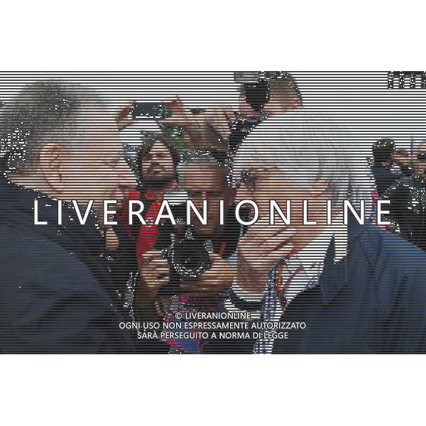 (L to R): Jean Todt (FRA) FIA President with Bernie Ecclestone (GBR) on the grid. 05.07.2015. Formula 1 World Championship, Rd 9, British Grand Prix, Silverstone, England, Race Day. AG ALDO LIVERANI SAS ONLY ITALY