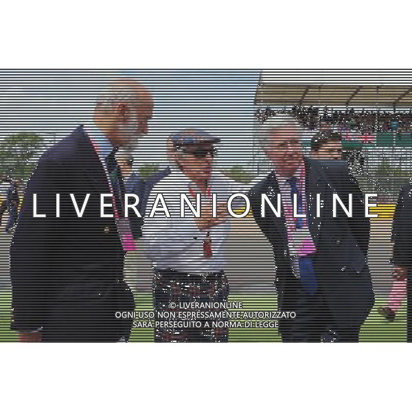 (L to R): HRH Prince Michael of Kent (GBR) with Jackie Stewart (GBR) and Michael Fallon MP (GBR) Defence Secretary on the grid. 05.07.2015. Formula 1 World Championship, Rd 9, British Grand Prix, Silverstone, England, Race Day. AG ALDO LIVERANI SAS ONLY ITALY