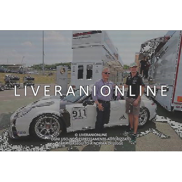 (L to R): Johnny Herbert (GBR) Sky Sports F1 Presenter and his Porsche Supercup car, with Nico Hulkenberg (GER) Sahara Force India F1. 23.07.2015. Formula 1 World Championship, Rd 10, Hungarian Grand Prix, Budapest, Hungary, Preparation Day. ONLY ITALY-AG ALDO LIVERANI SAS