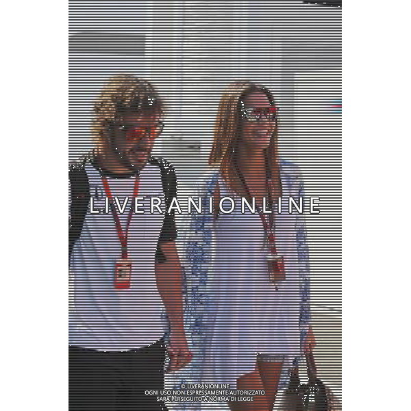 (L to R): Fernando Alonso (ESP) McLaren with his girlfriend Lara Alvarez (ESP). 25.07.2015. Formula 1 World Championship, Rd 10, Hungarian Grand Prix, Budapest, Hungary, Qualifying Day. AG ALDO LIVERANI SAS ONLY ITALY