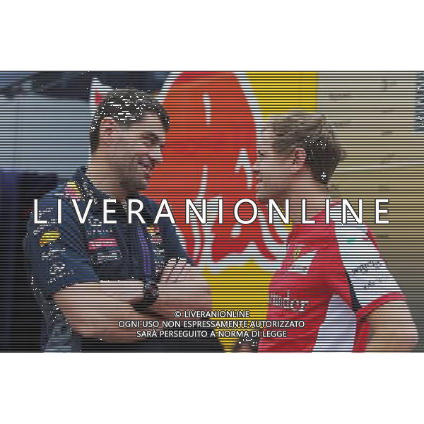 (L to R): Guillaume Rocquelin (ITA) Red Bull Racing Head of Race Engineering with Sebastian Vettel (GER) Ferrari. 26.07.2015. Formula 1 World Championship, Rd 10, Hungarian Grand Prix, Budapest, Hungary, Race Day. /AGENZIA ALDO LIVERANI Sas - ITALY ONLY - EDITORIAL USE ONLY