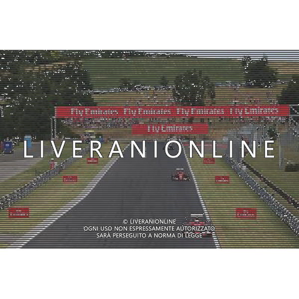 Sebastian Vettel (GER) Ferrari SF15-T leads the race. 26.07.2015. Formula 1 World Championship, Rd 10, Hungarian Grand Prix, Budapest, Hungary, Race Day. /AGENZIA ALDO LIVERANI Sas - ITALY ONLY - EDITORIAL USE ONLY