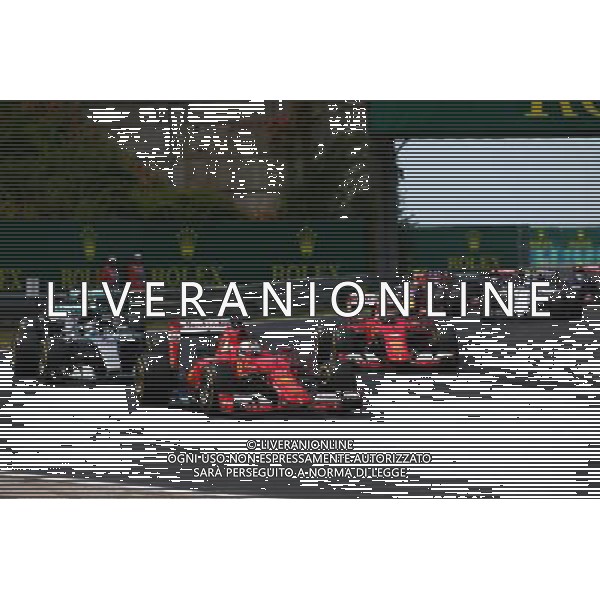 Sebastian Vettel (GER) Ferrari SF15-T leads at the start of the race. 26.07.2015. Formula 1 World Championship, Rd 10, Hungarian Grand Prix, Budapest, Hungary, Race Day. /AGENZIA ALDO LIVERANI Sas - ITALY ONLY - EDITORIAL USE ONLY