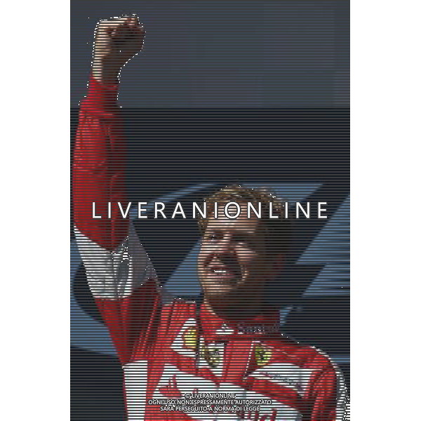 1st place Sebastian Vettel (GER) Ferrari. 26.07.2015. Formula 1 World Championship, Rd 10, Hungarian Grand Prix, Budapest, Hungary, Race Day. AG ALDO LIVERANI SAS ONLY ITALY