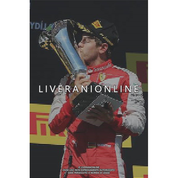 Race winner Sebastian Vettel (GER) Ferrari celebrates on the podium. 26.07.2015. Formula 1 World Championship, Rd 10, Hungarian Grand Prix, Budapest, Hungary, Race Day. AG ALDO LIVERANI SAS ONLY ITALY